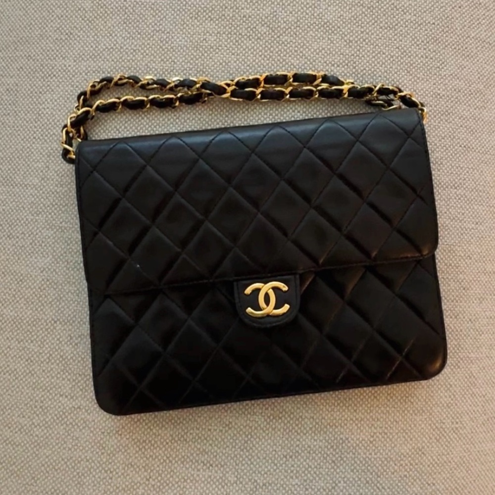 CHANEL Black Flap Lambskin with gold hardware and chain
